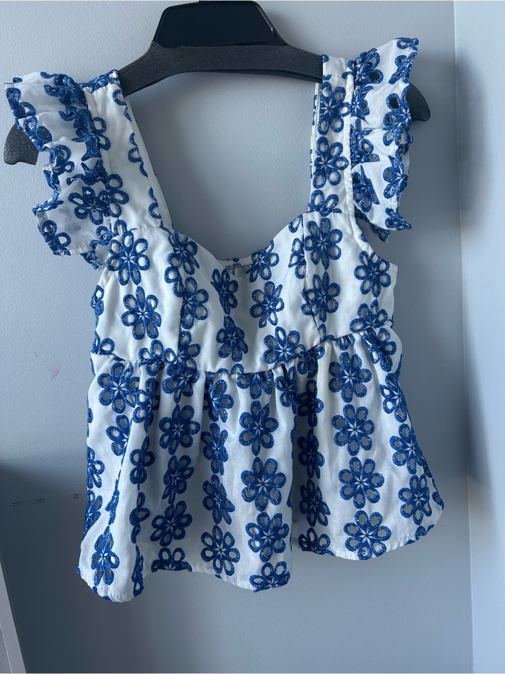 SHEIN White Top with Blue Floral Embroidery and Ruffle Sleeves